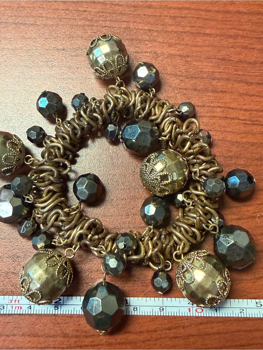 Chunky Gold-Tone Beaded Bracelet with faceted gunmetal beads & Filigree Accents